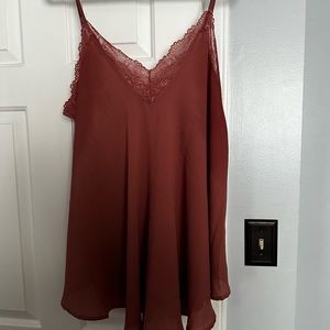 Semi sheer flowy cami.